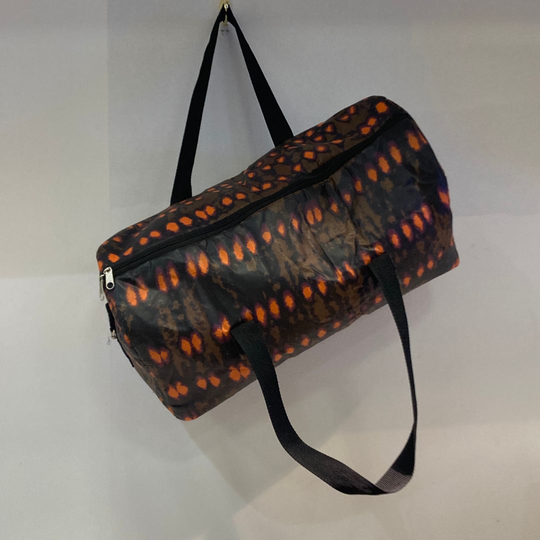 Gym or Travel Bag Changing Lives in Uganda - orange dot