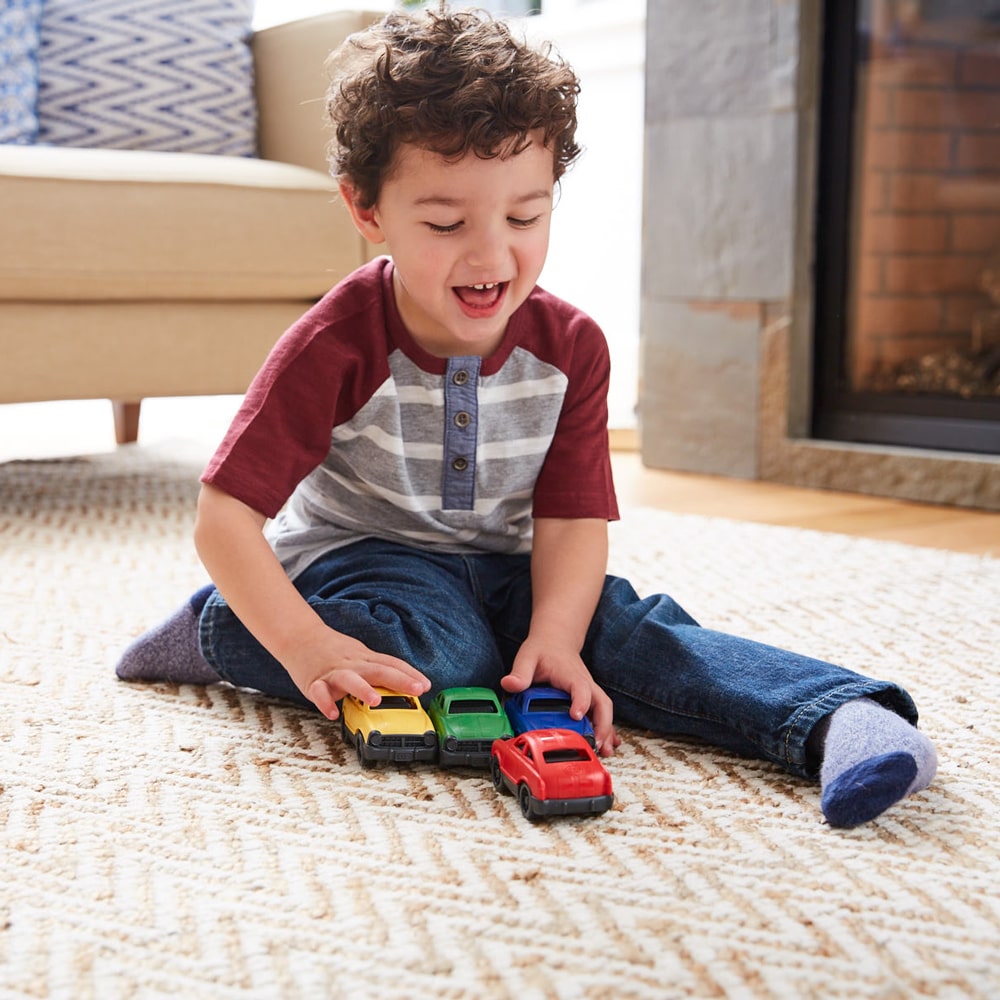 Green Toys Mini Car - child playing with mini toy cars