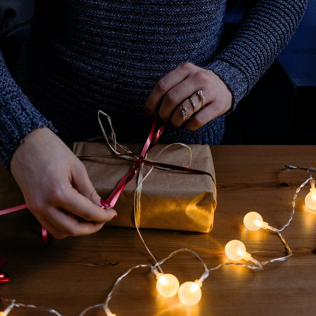 Person wrapping gift