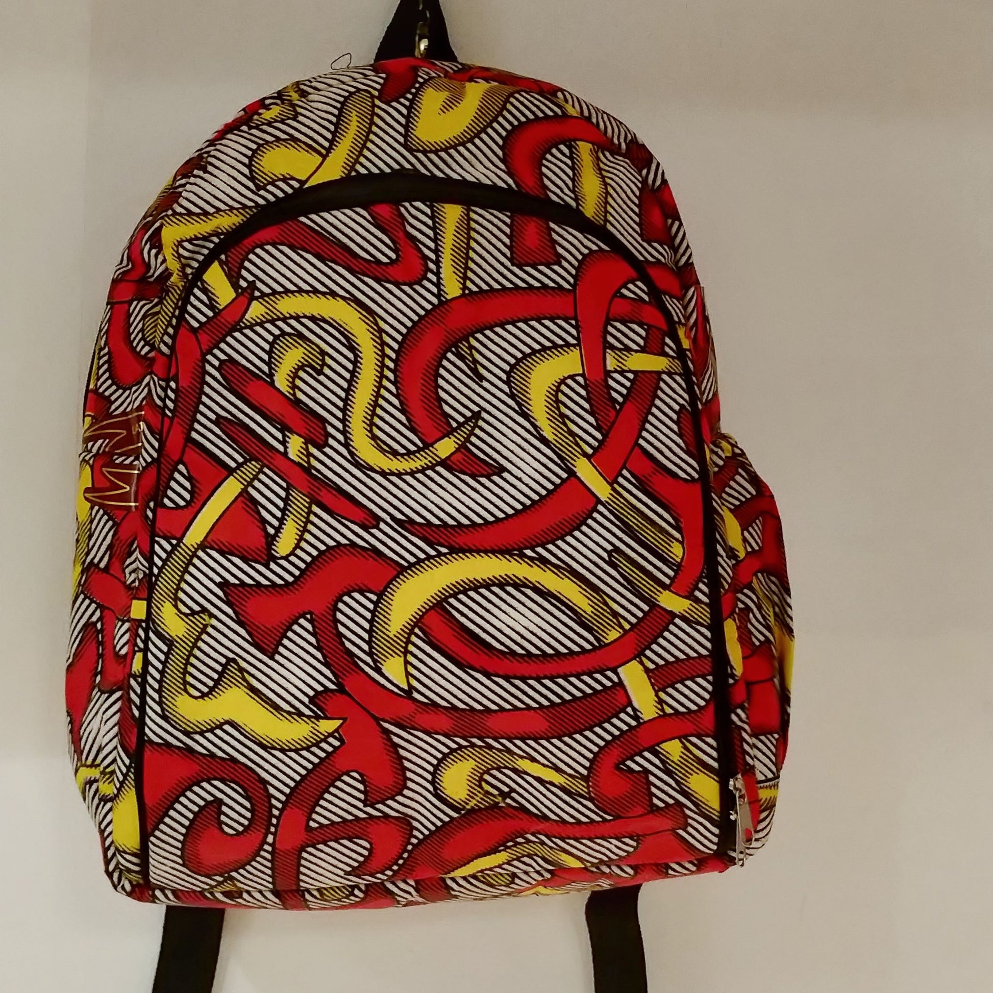 Handmade Backpack Empowering Women in Uganda - red swirl