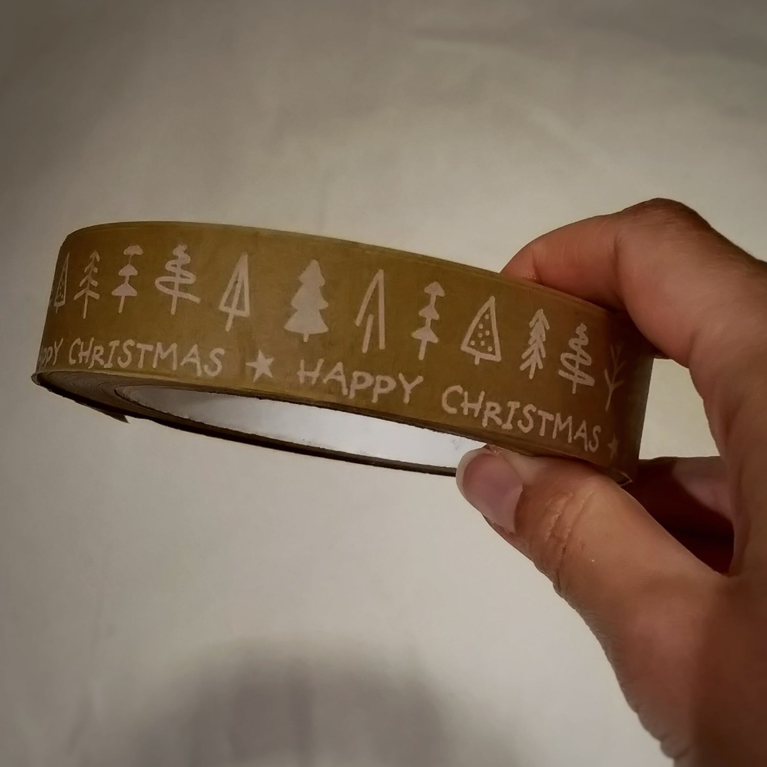 Happy Christmas Eco Friendly Paper Tape - in hand