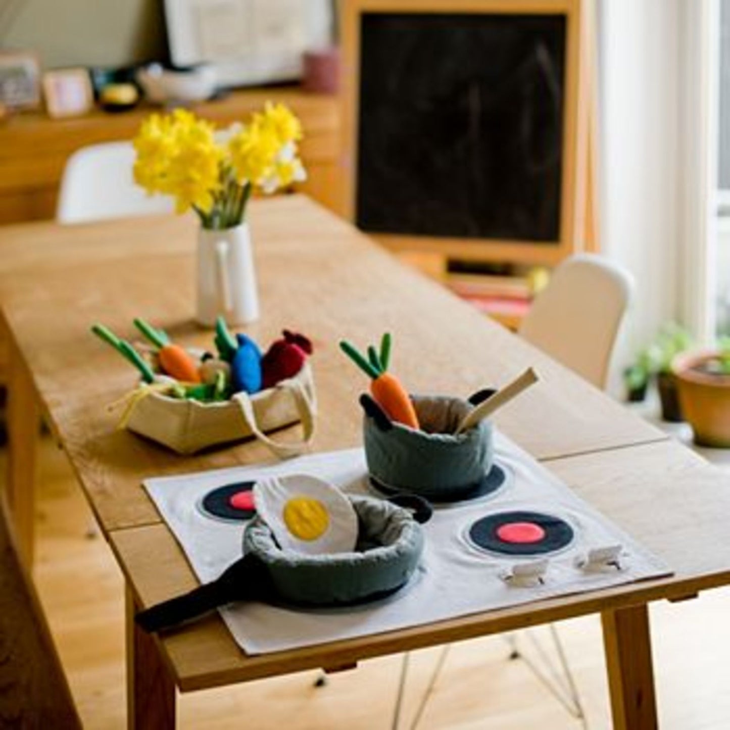 Fair trade cotton cooking play set from Weaving Hope toys on table