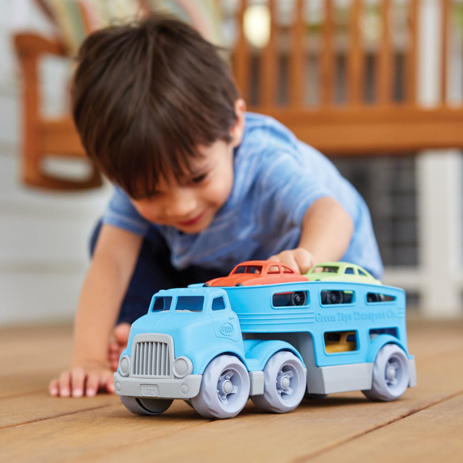 Child playing with Green Toys Car Carrier - recycled plastic eco toys