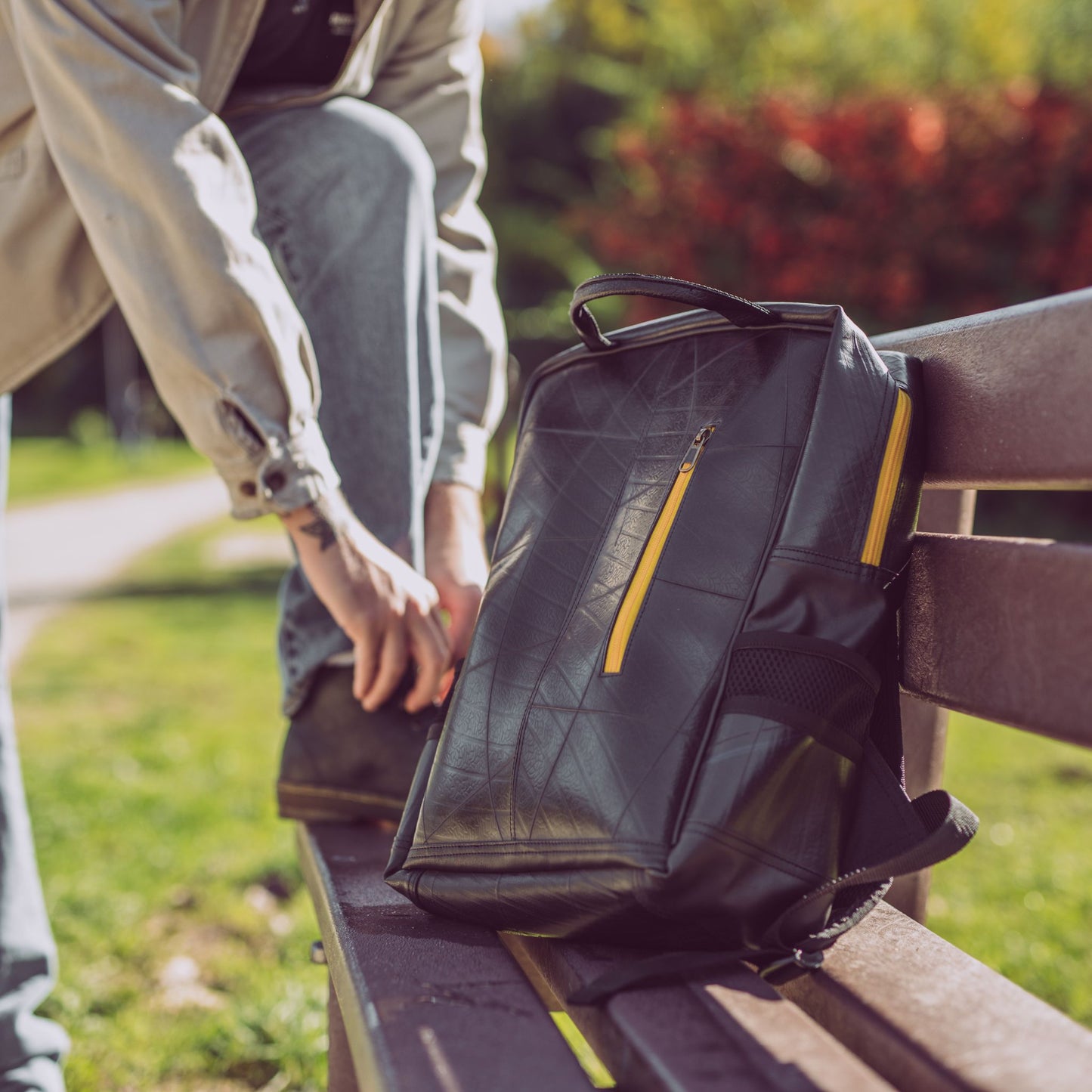 Hackney Backpack made from Recycled Materials - on bench