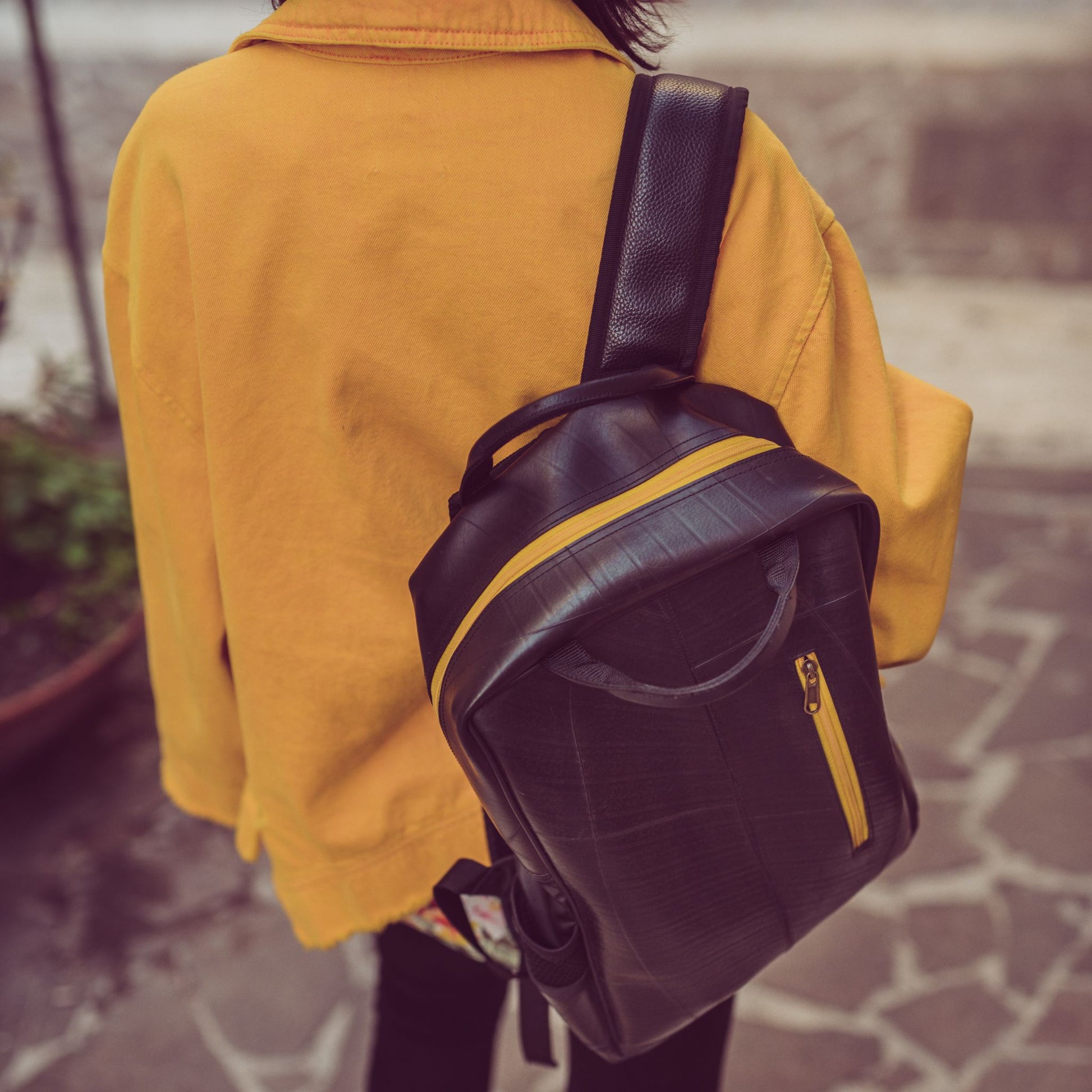 Hackney Backpack made from Recycled Materials - top on shoulder
