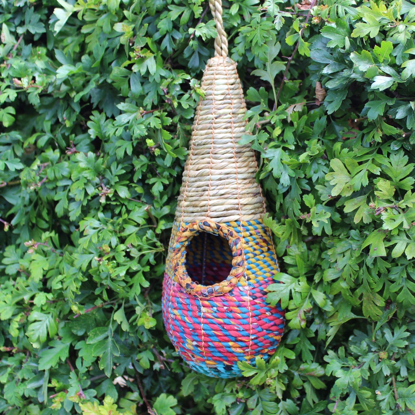 Handmade and Fair Trade Bird Nester - Tahera birdhouse sited in hedge
