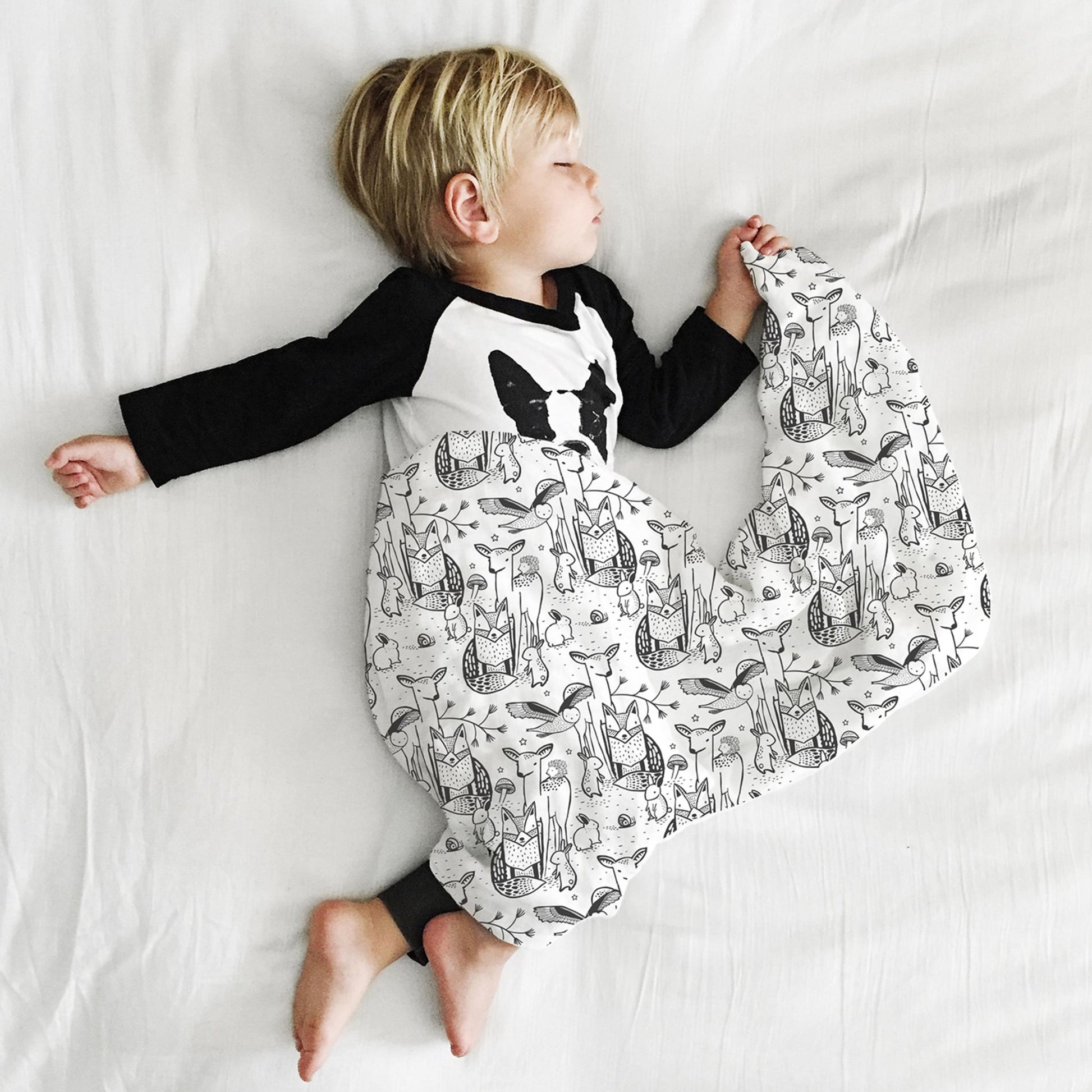 Organic Cotton Swaddle Forest Print - child sleeping with swaddle