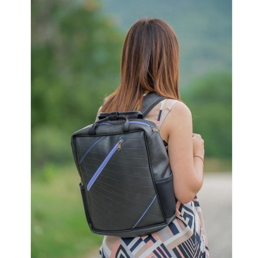 Portobello Backpack made from Recycled Materials - purple being worn