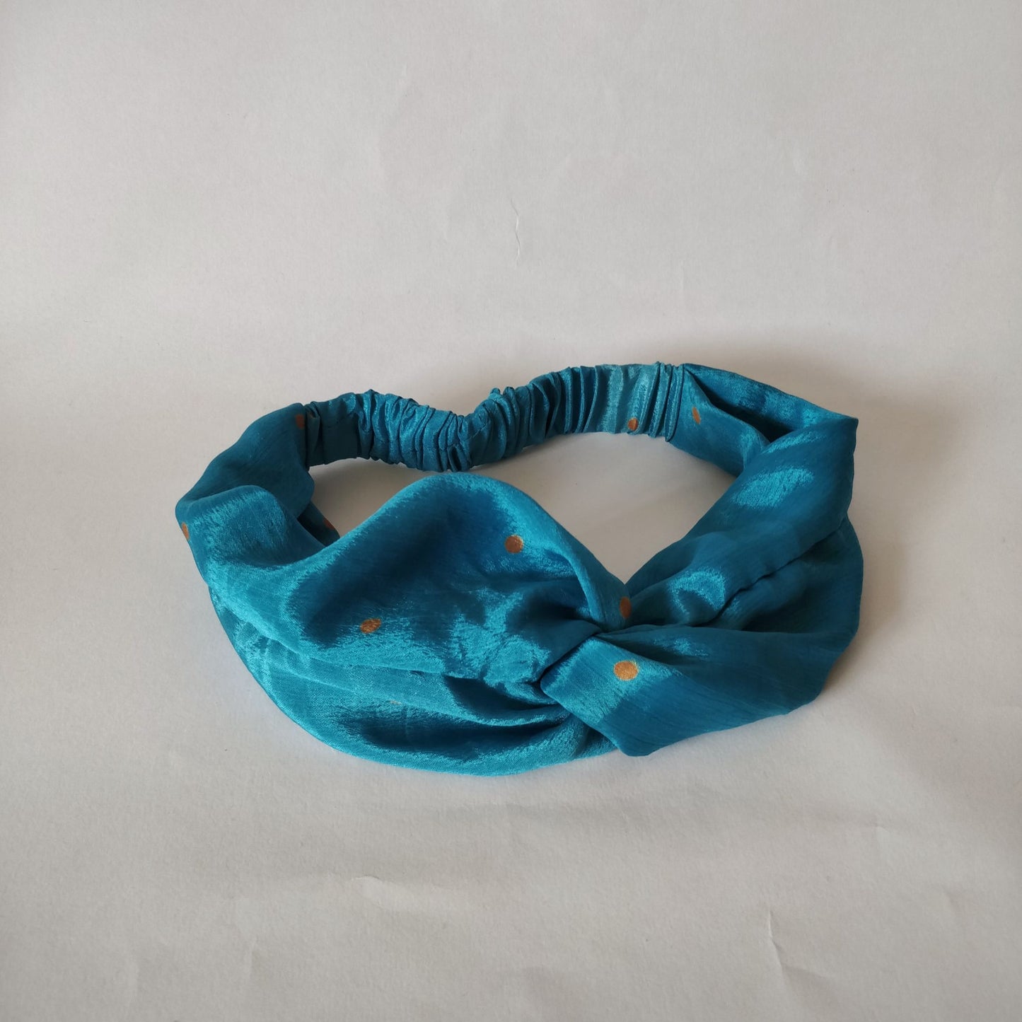 Turban Headband Made from Upcycled Saris - blue silk headband - laid flat on white background