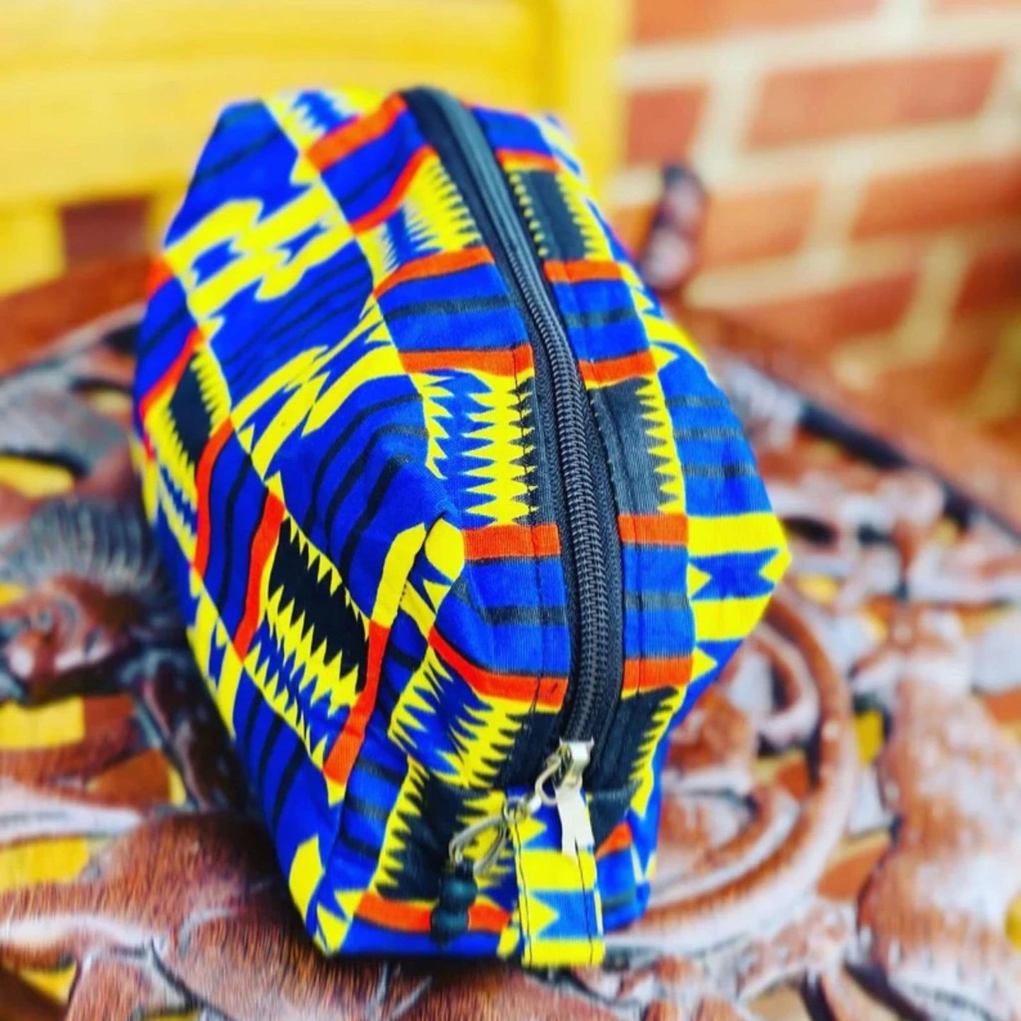 Wash bag changing lives - kente print